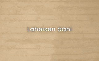 Beige tiiliseinä, jossa lukee Läheisen ääni valkoisella kirjoituksella.