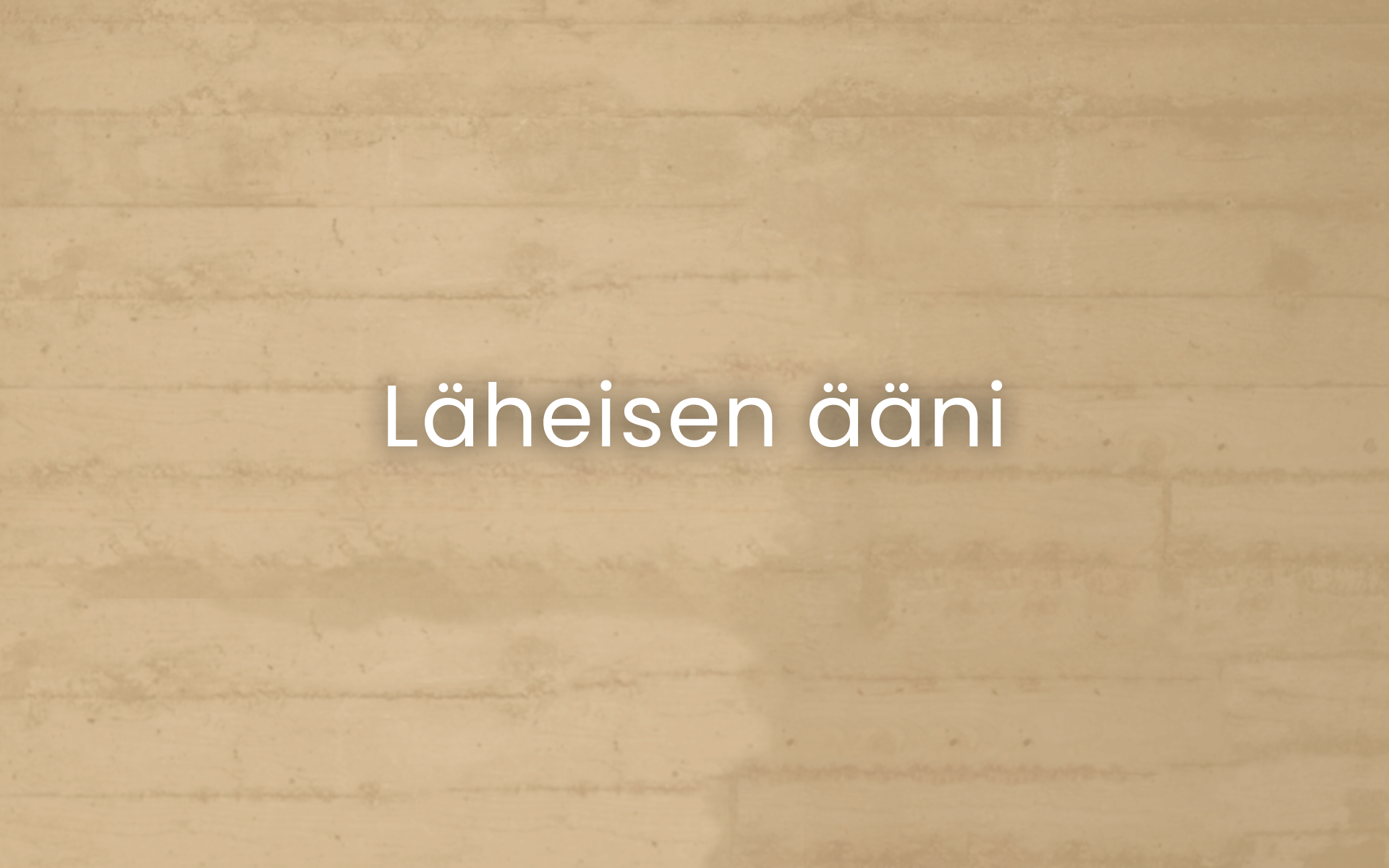 Beige tiiliseinä, jossa lukee Läheisen ääni valkoisella kirjoituksella.